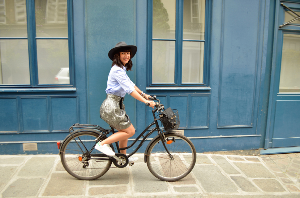 Blue shirt and black bicycle